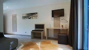 Double Room | Living area | Flat-screen TV