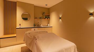 Relax in a serene space with a single bed, large mirror, and stylish shelf.