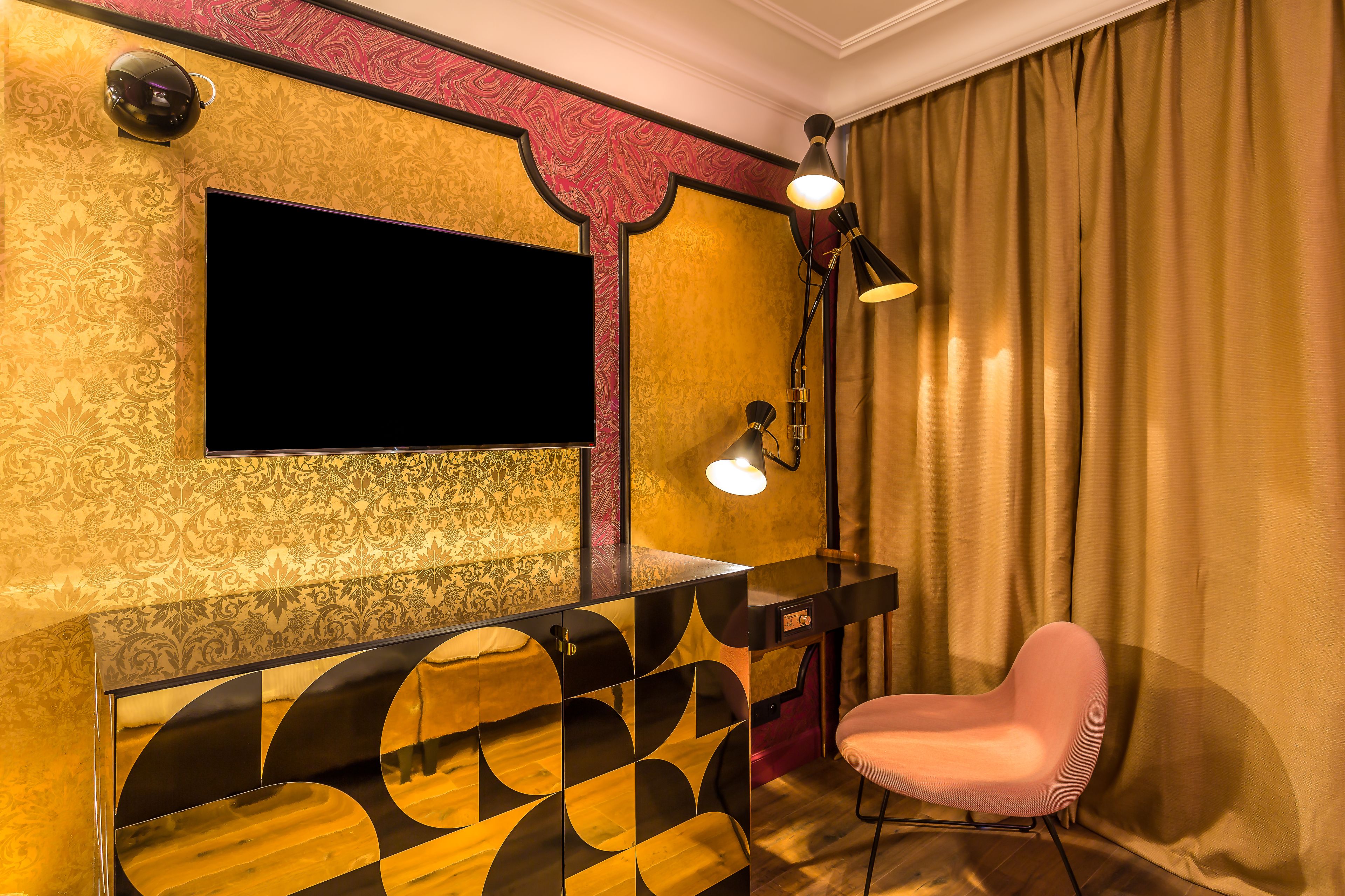 deluxe double room (light my fire) | living area | flat-screen tv