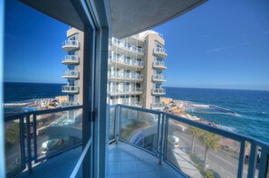 Enjoy breathtaking ocean views from the comfort of your balcony.