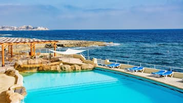 Indoor pool, outdoor pool, pool umbrellas, sun loungers