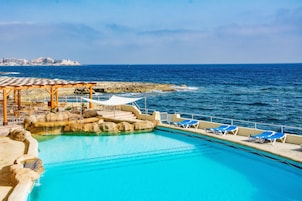 Indoor pool, outdoor pool, pool umbrellas, sun loungers