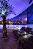 Indoor pool, outdoor pool, pool umbrellas, sun loungers