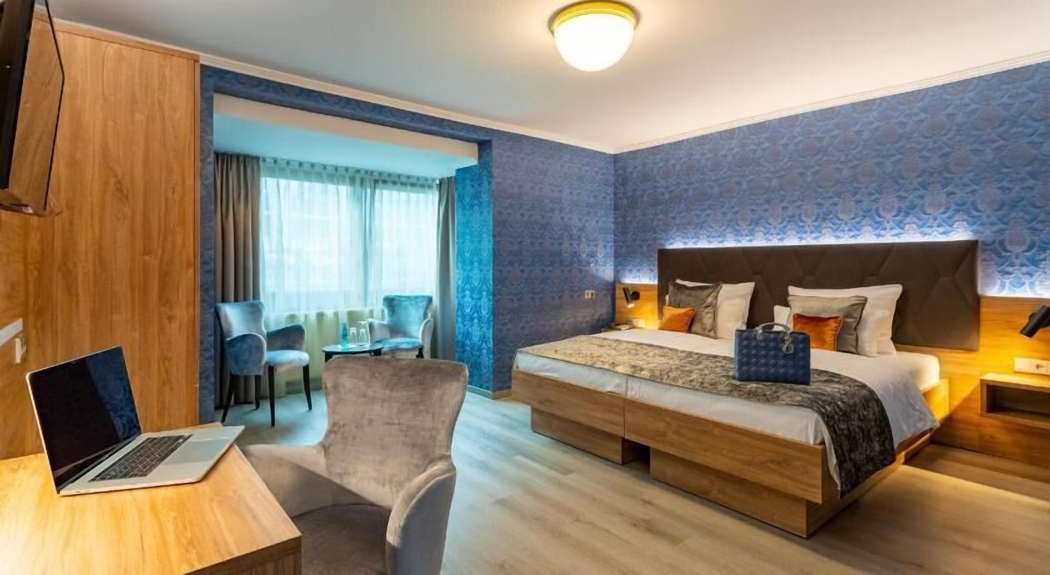 Hypoallergeen beddengoed, een minibar, een kluis op de kamer