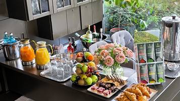 Daily buffet breakfast (EUR 18 per person)