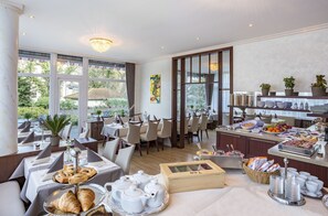 Daily buffet breakfast (EUR 18 per person)