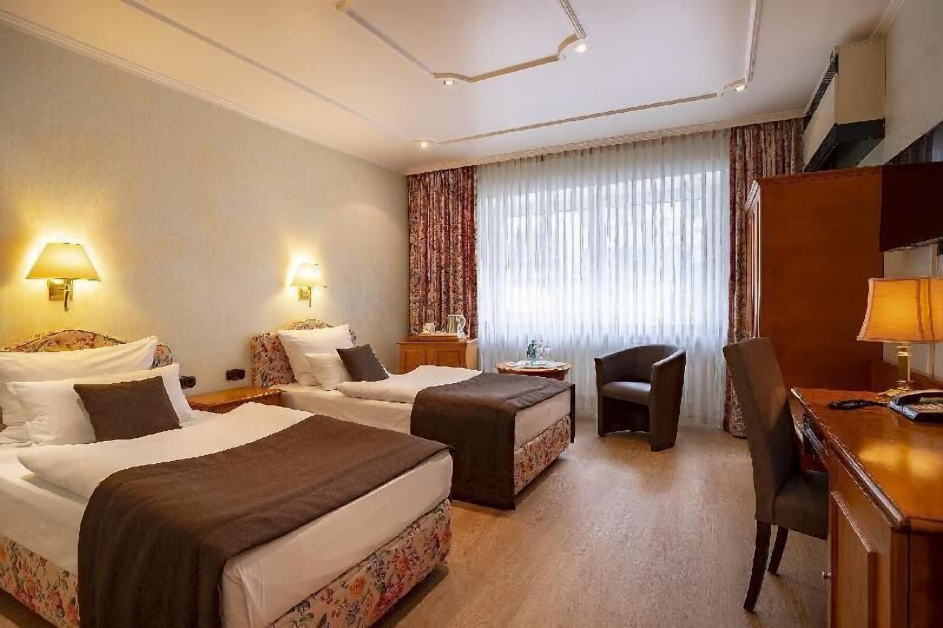 Hypoallergeen beddengoed, een minibar, een kluis op de kamer