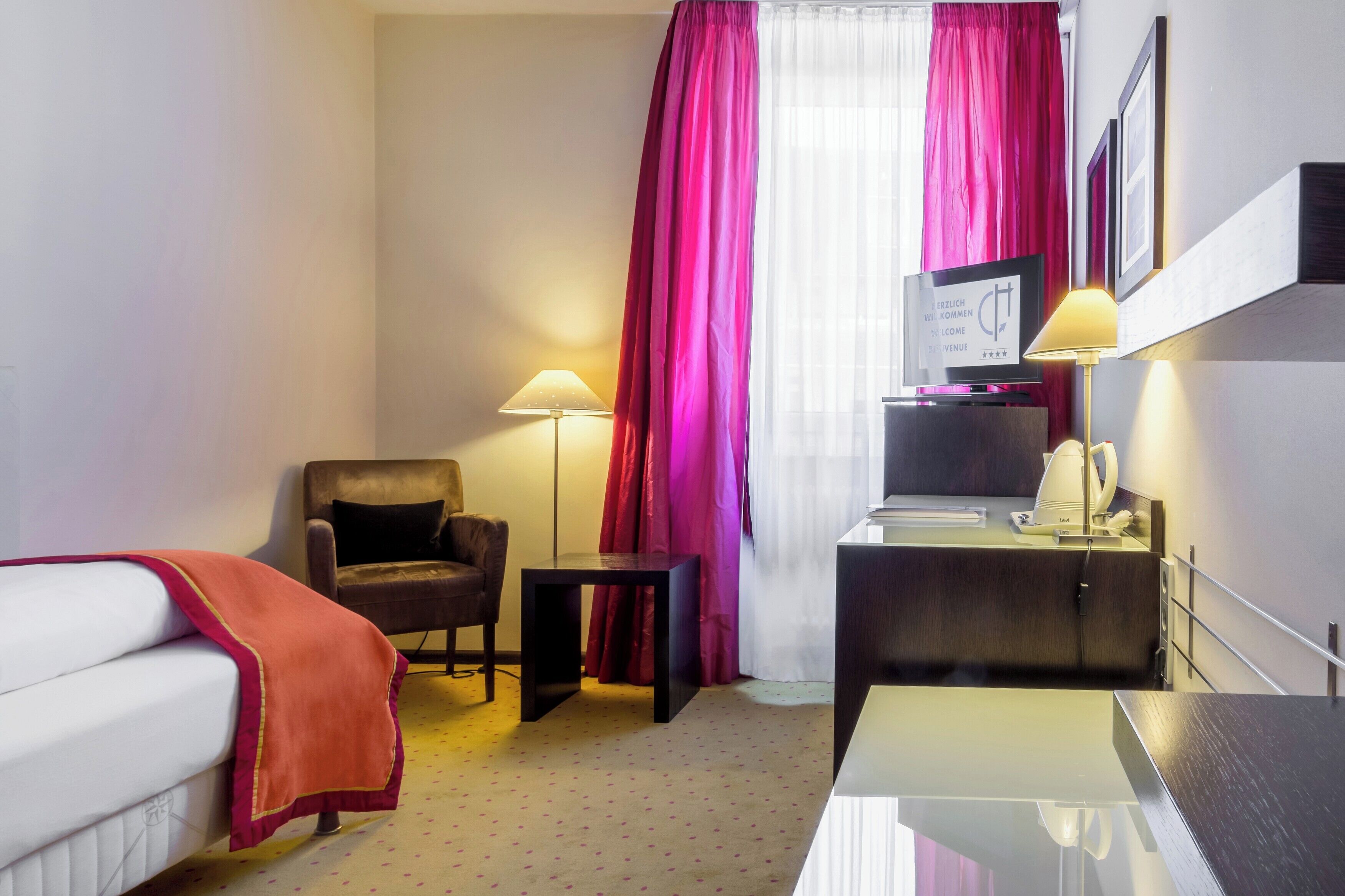 Hypo-allergenic bedding, minibar, in-room safe, desk