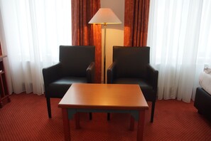 Double or Twin Room | Living area | Flat-screen TV