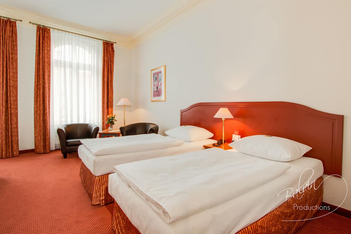 Camera Comfort | Biancheria da letto ipoallergenica, materassi a doppio strato, minibar