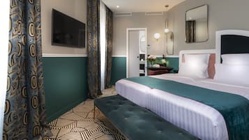 Free minibar items, in-room safe, individually decorated, desk