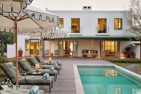 Outdoor pool, pool umbrellas, sun loungers