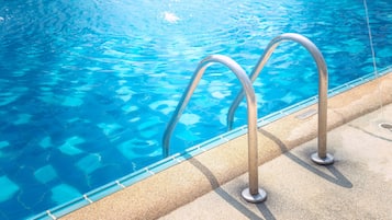 Outdoor pool, open 8:00 AM to 7:00 PM, sun loungers