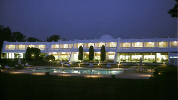 Outdoor pool, open 8:00 AM to 7:00 PM, pool loungers