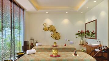 Relax in a spacious room with a large bed, two bedside tables, and a large mirror.