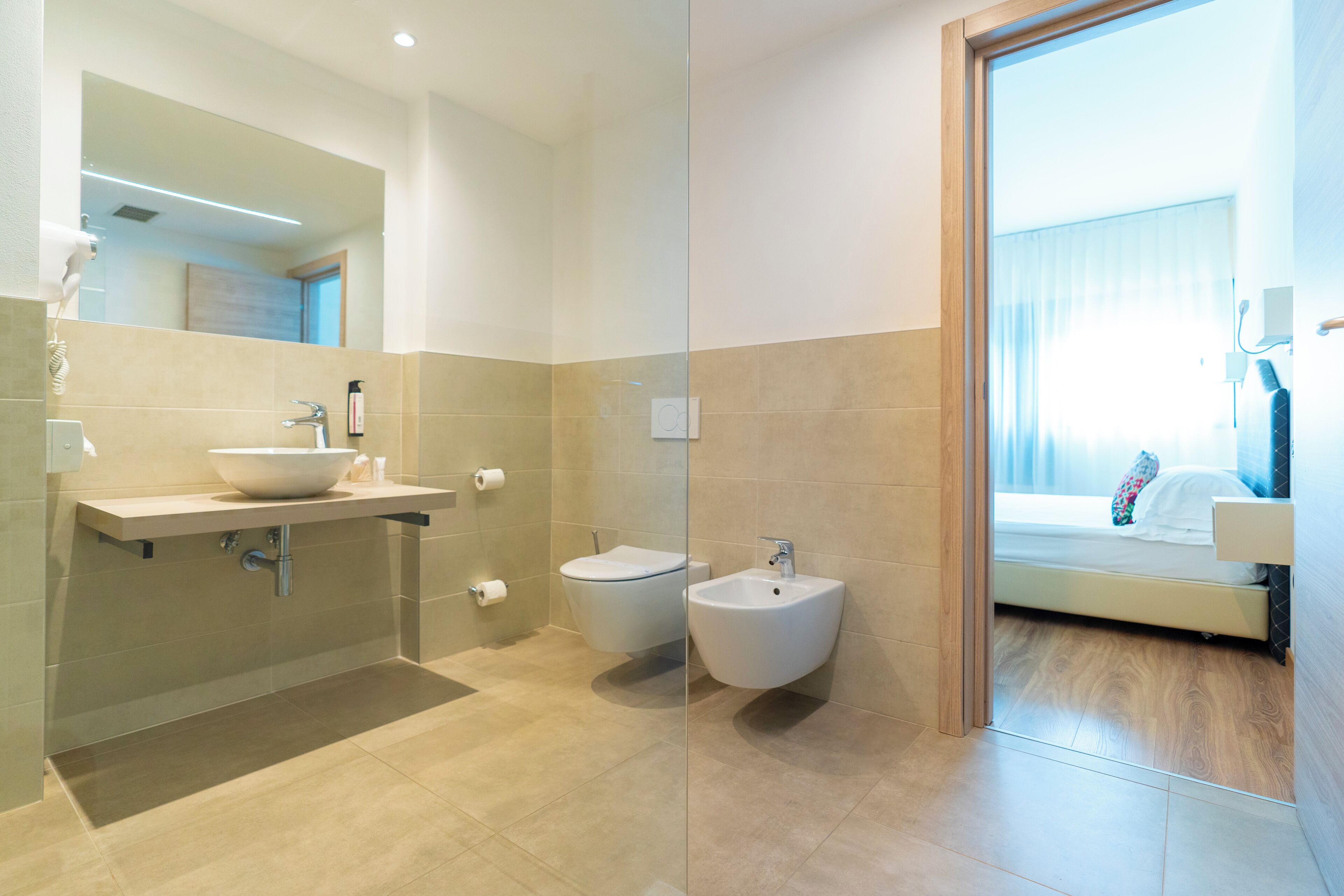 free toiletries, hair dryer, bathrobes, bidet