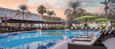 Outdoor pool, pool umbrellas, pool loungers