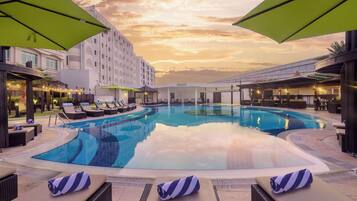 Outdoor pool, pool umbrellas, sun loungers
