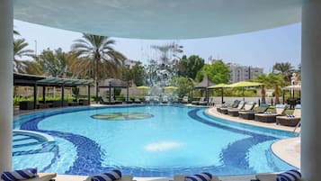 Outdoor pool, pool umbrellas, sun loungers