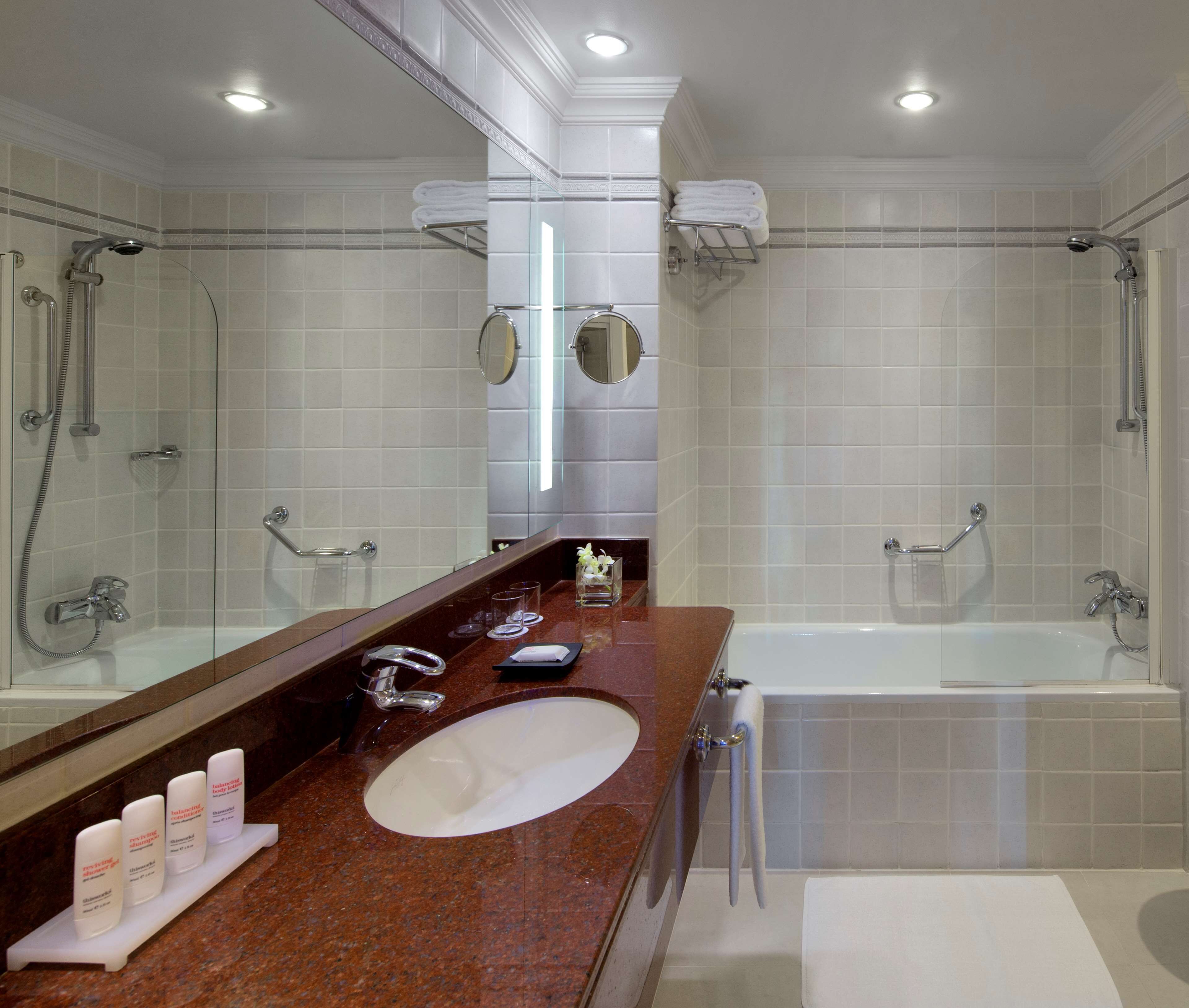 combined shower/bathtub, free toiletries, hair dryer, slippers