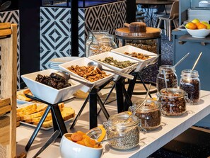 Daily buffet breakfast (EUR 18 per person)