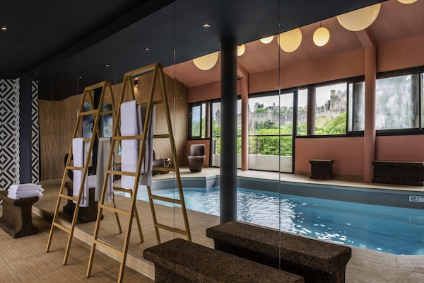 Indoor pool, open 10:00 AM to 9:00 PM, sun loungers