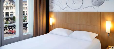 Premium bedding, desk, blackout curtains, soundproofing