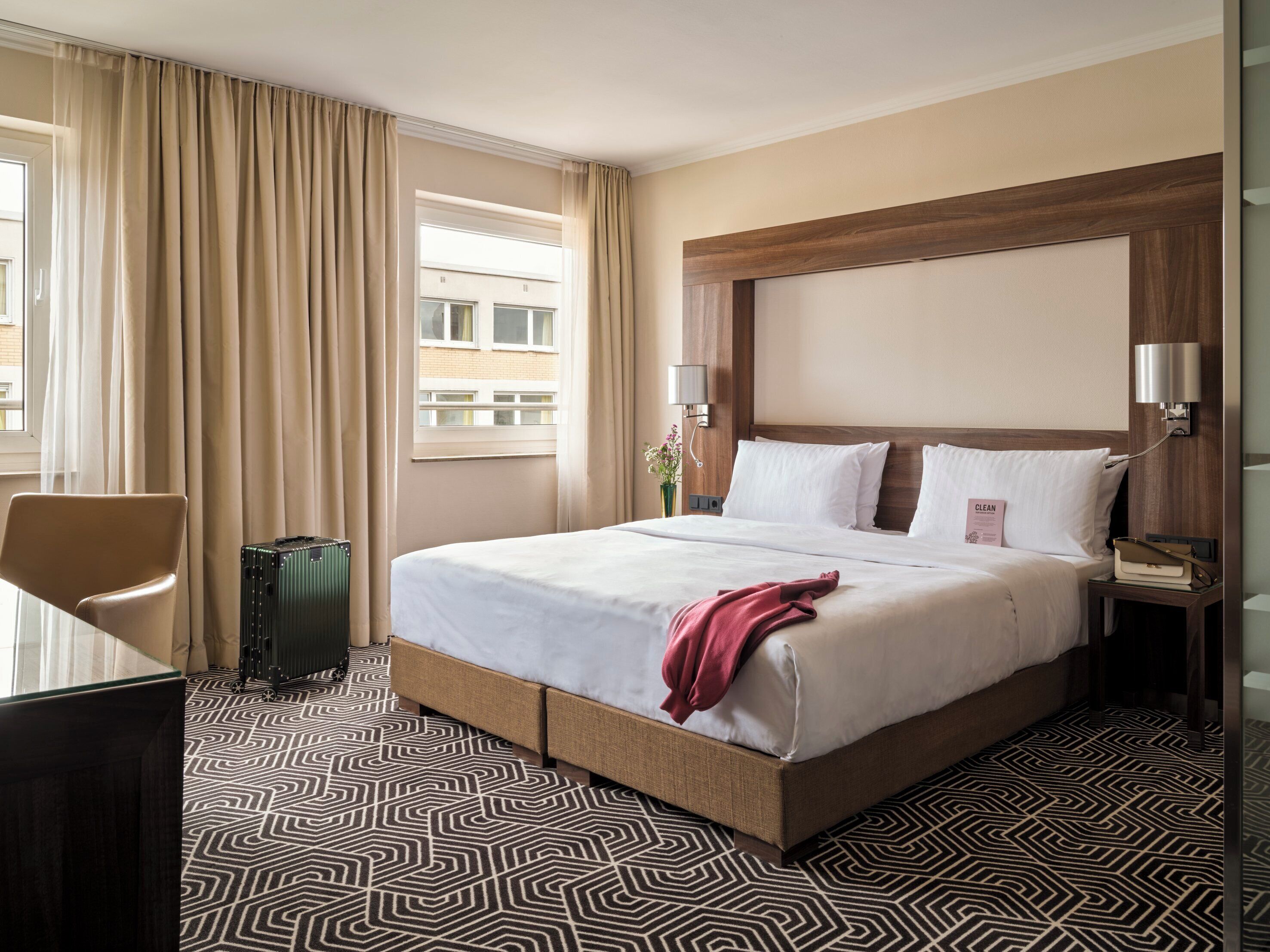 Hypo-allergenic bedding, pillowtop beds, in-room safe, desk