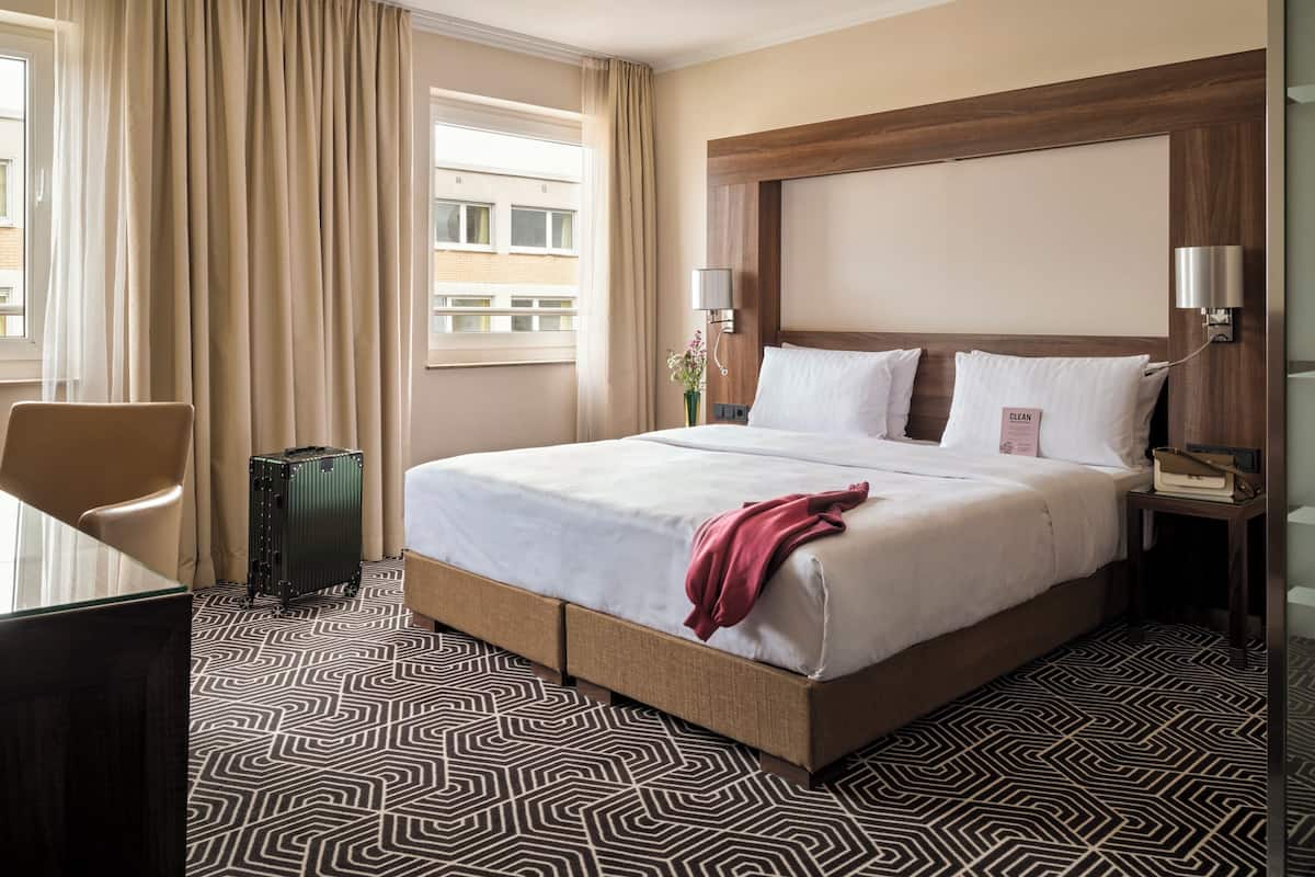 Hypo-allergenic bedding, pillowtop beds, in-room safe, desk