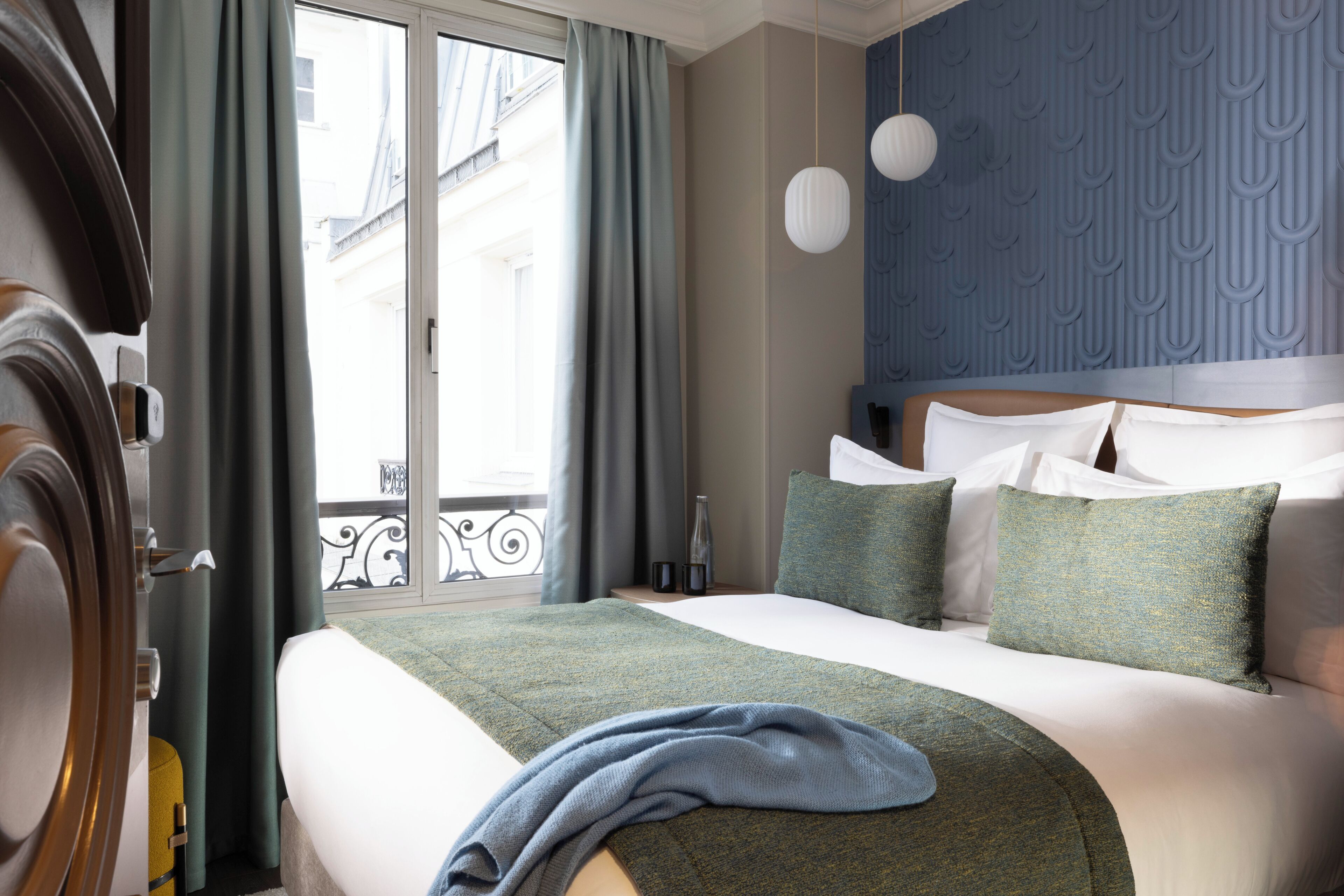 Chambres Communicantes | Literie de qualité supérieure, coffres-forts dans les chambres