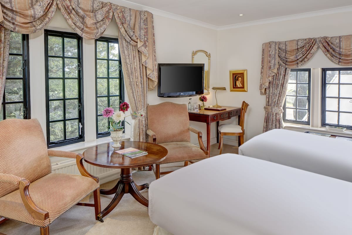 twin room | in-room safe, individually decorated, desk, iron/ironing board