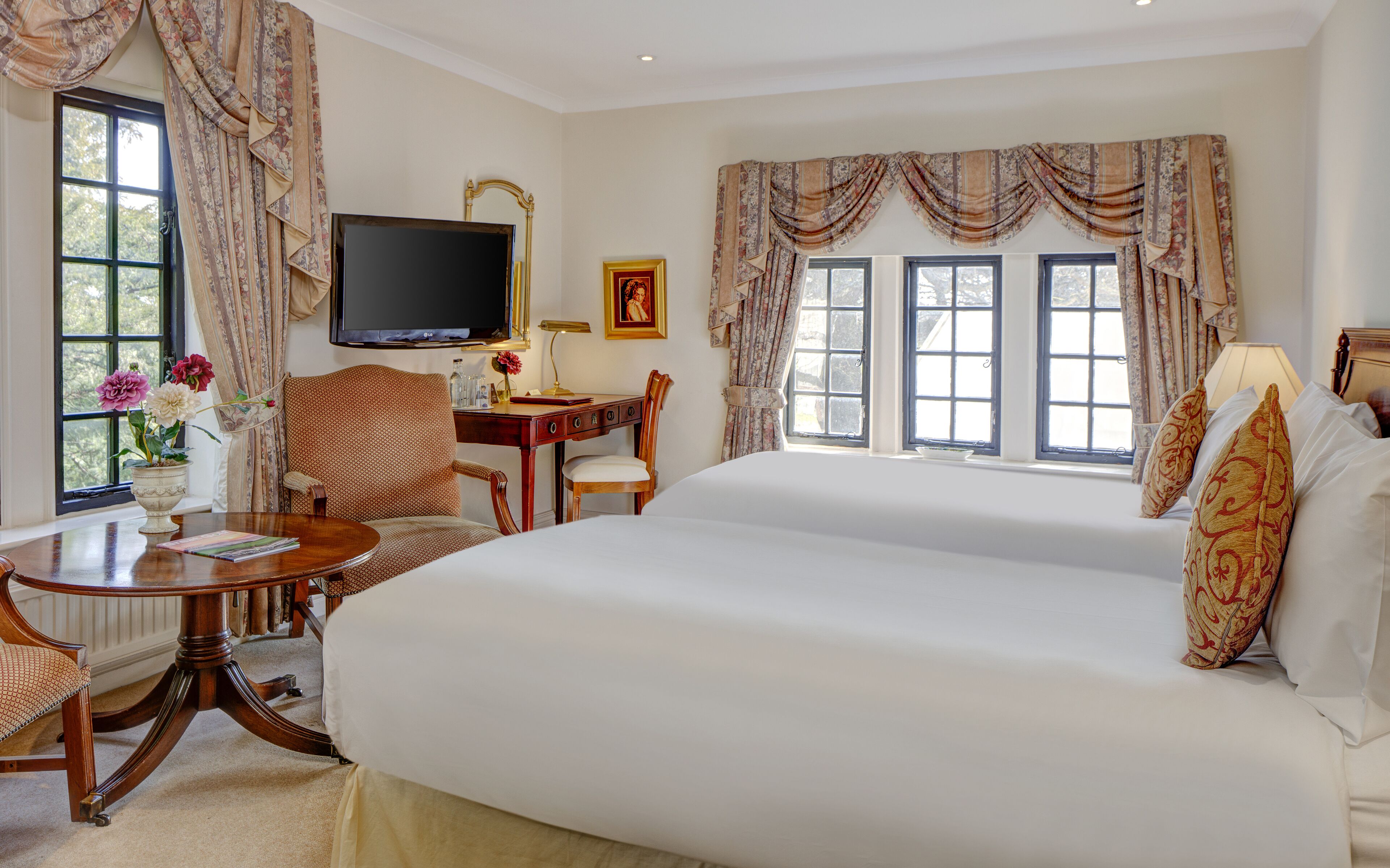 twin room | in-room safe, individually decorated, desk, iron/ironing board