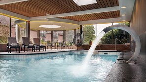 Indoor pool, pool umbrellas, sun loungers