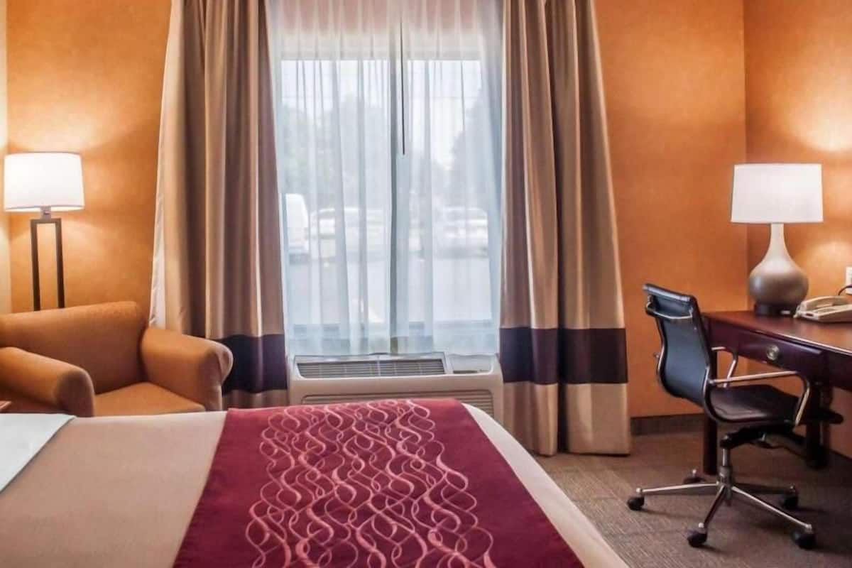 Premium bedding, desk, blackout drapes, iron/ironing board