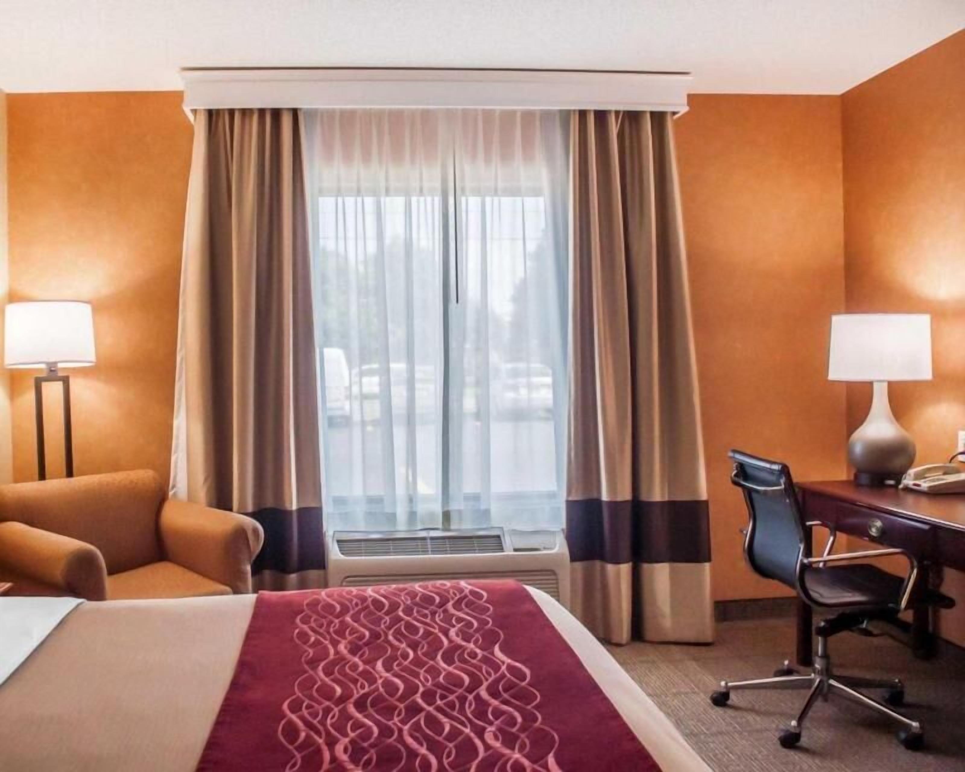 Premium bedding, desk, blackout drapes, iron/ironing board