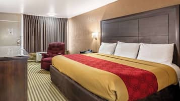 Standard Room, 1 King Bed, Non Smoking | Pillowtop beds, desk, iron/ironing board, rollaway beds