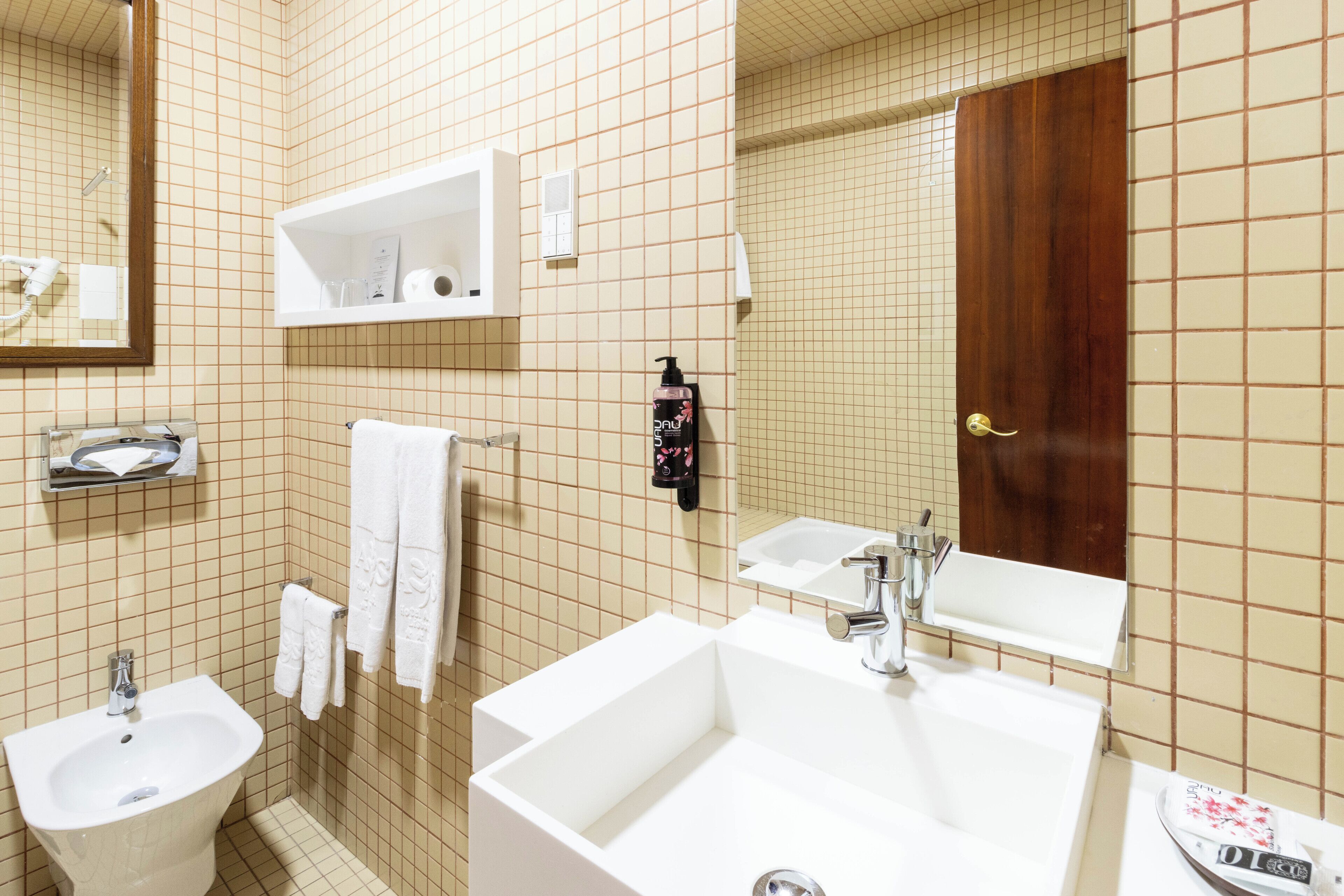 comfort double room, 1 king bed | bathroom | rainfall showerhead, free toiletries, hair dryer, towels