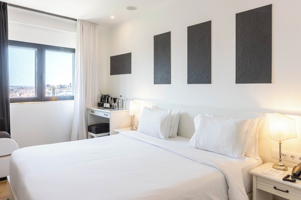 Comfort Double Room, 1 Queen Bed | Minibar, in-room safe, individually decorated, desk