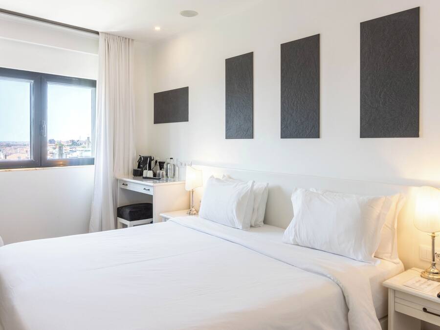 Comfort Double Room, 1 Queen Bed | Minibar, in-room safe, individually decorated, desk