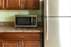 Deluxe Apartment, 2 Bedrooms, Ocean View | Private kitchen | Fridge, microwave, coffee/tea maker, toaster oven