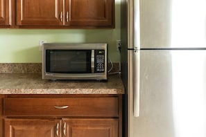 Deluxe Apartment, 2 Bedrooms, Ocean View | Private kitchen | Fridge, microwave, coffee/tea maker, toaster oven