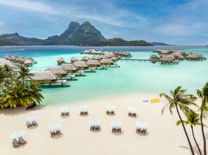 Private beach, white sand, sun-loungers, beach umbrellas