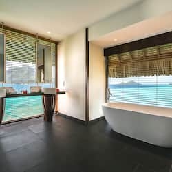 Suite, Overwater (End of Pontoon) | Bathroom | Designer toiletries, hair dryer, bathrobes, slippers