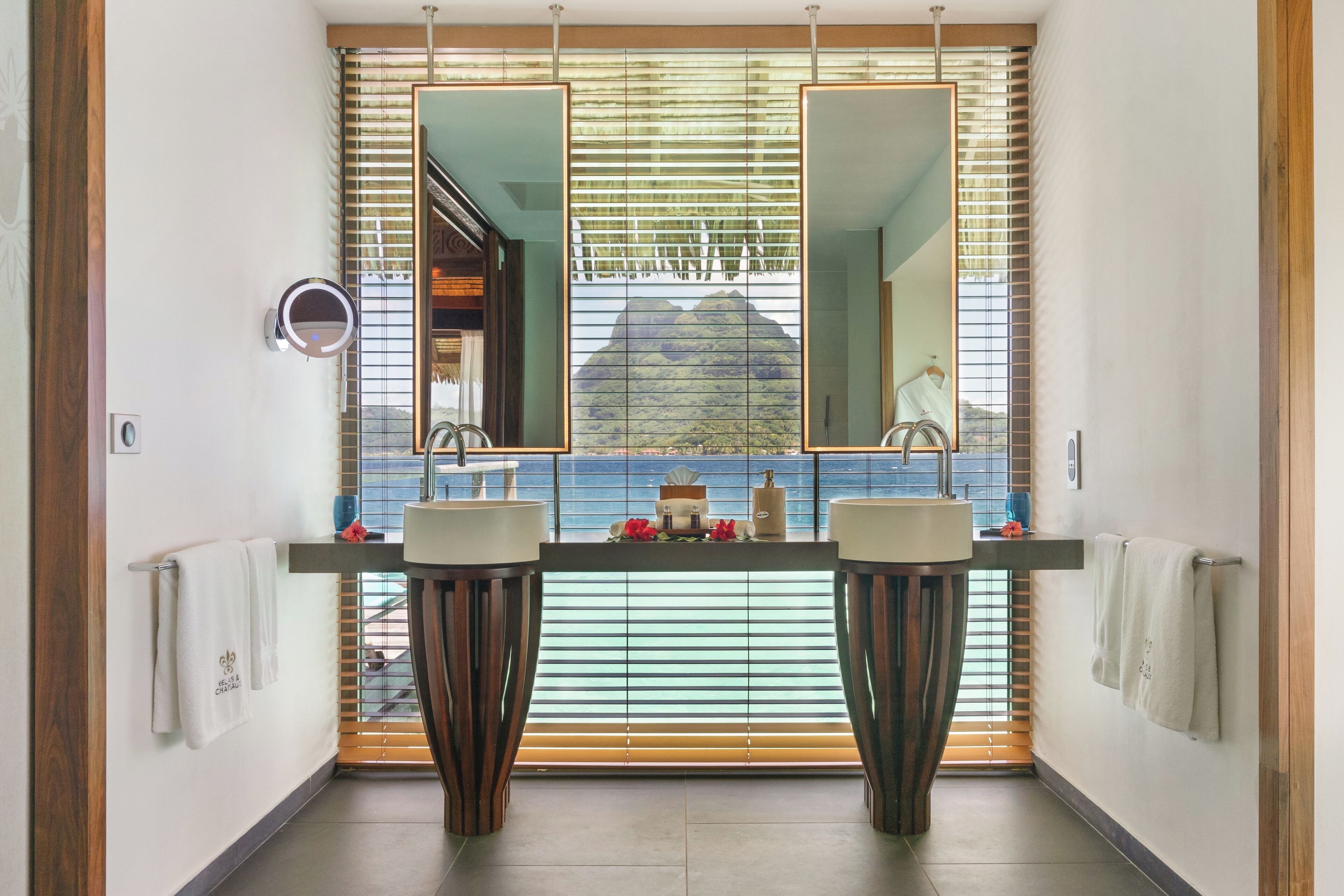 suite, overwater (end of pontoon) | bathroom | designer toiletries, hair dryer, bathrobes, slippers