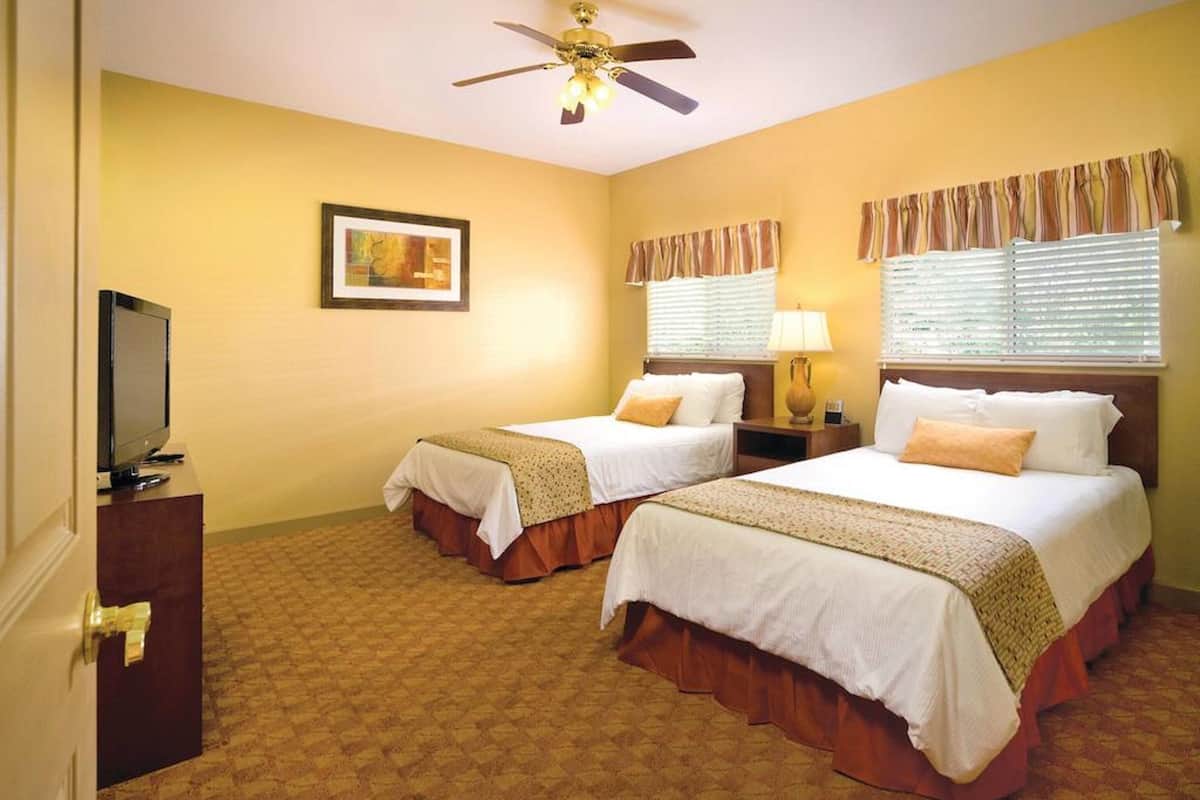 Premium bedding, pillow-top beds, blackout curtains, iron/ironing board