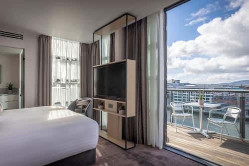 Deluxe Room, 1 Queen Bed, Balcony, River View (King Bed) | Egyptian cotton sheets, premium bedding, pillowtop beds, in-room safe
