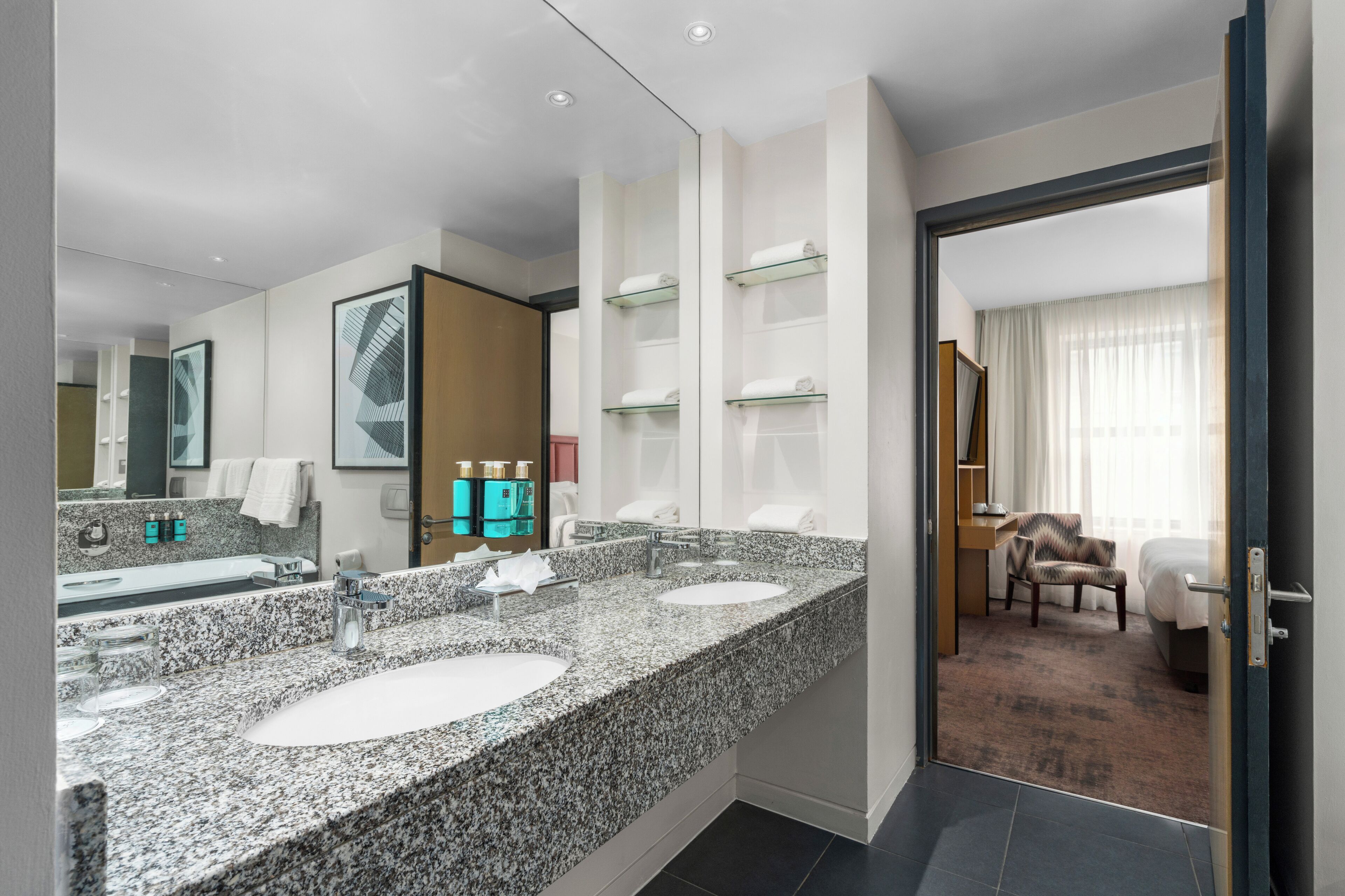 combined shower/bathtub, free toiletries, hair dryer, towels