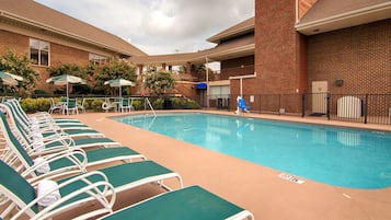 Seasonal outdoor pool, open 10:00 AM to 11:00 PM, pool loungers