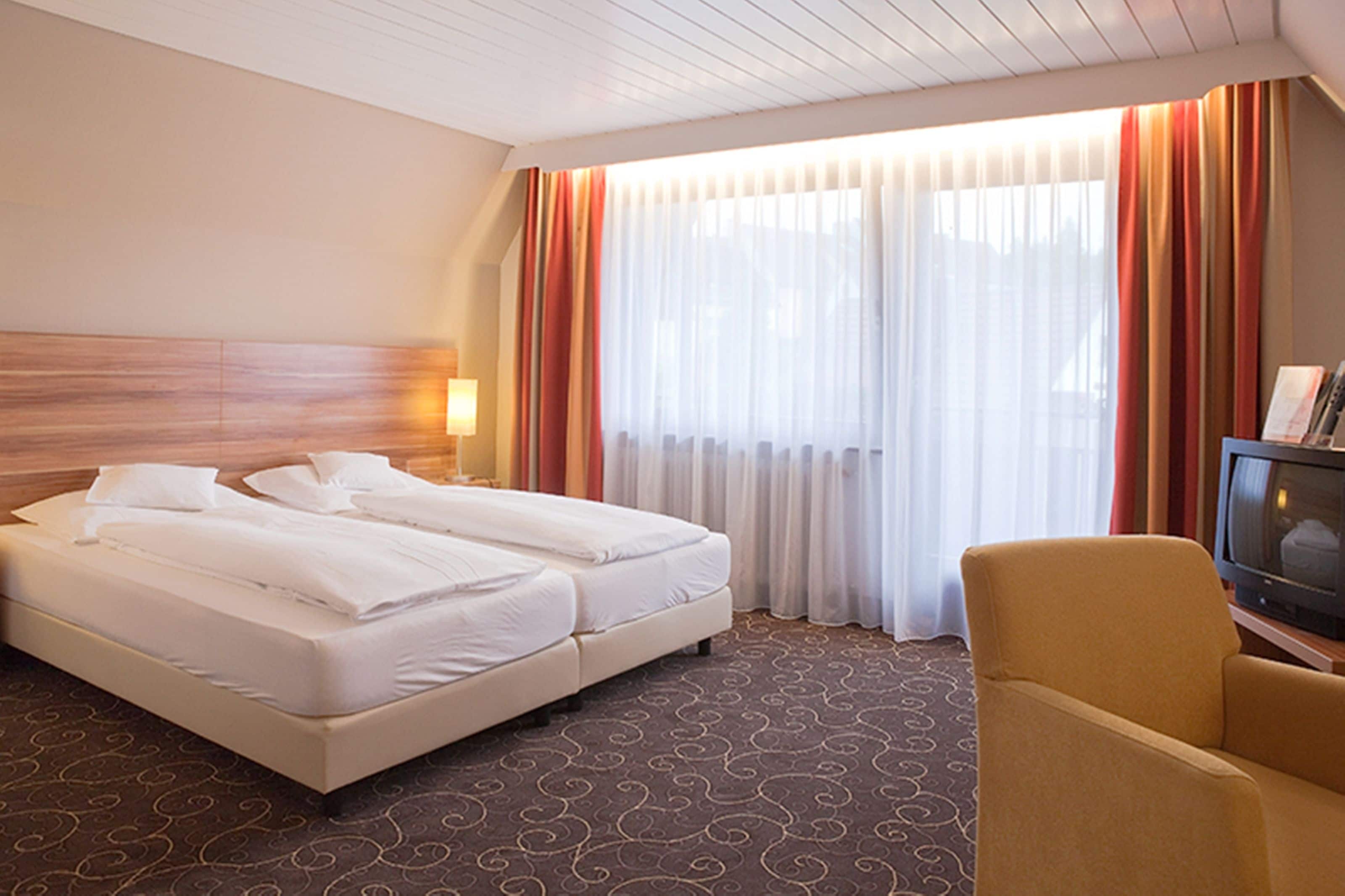 comfort room | desk, laptop workspace, blackout curtains, cots/infant beds