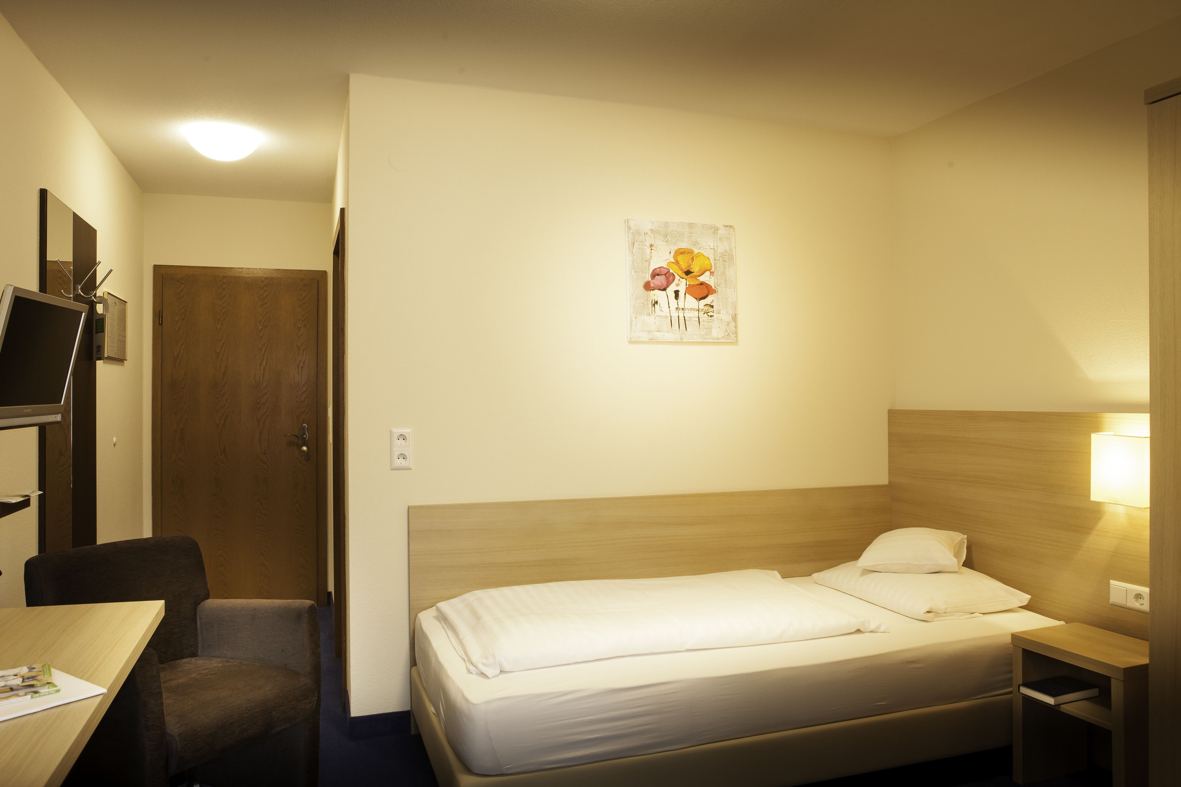 economy single room | desk, laptop workspace, blackout curtains, cots/infant beds